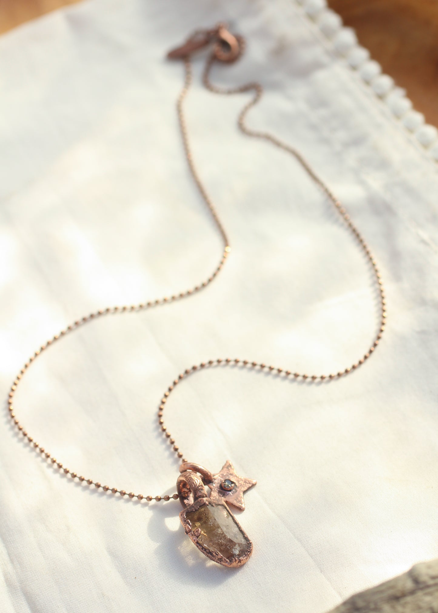 Raw and faceted Topaz charm necklace