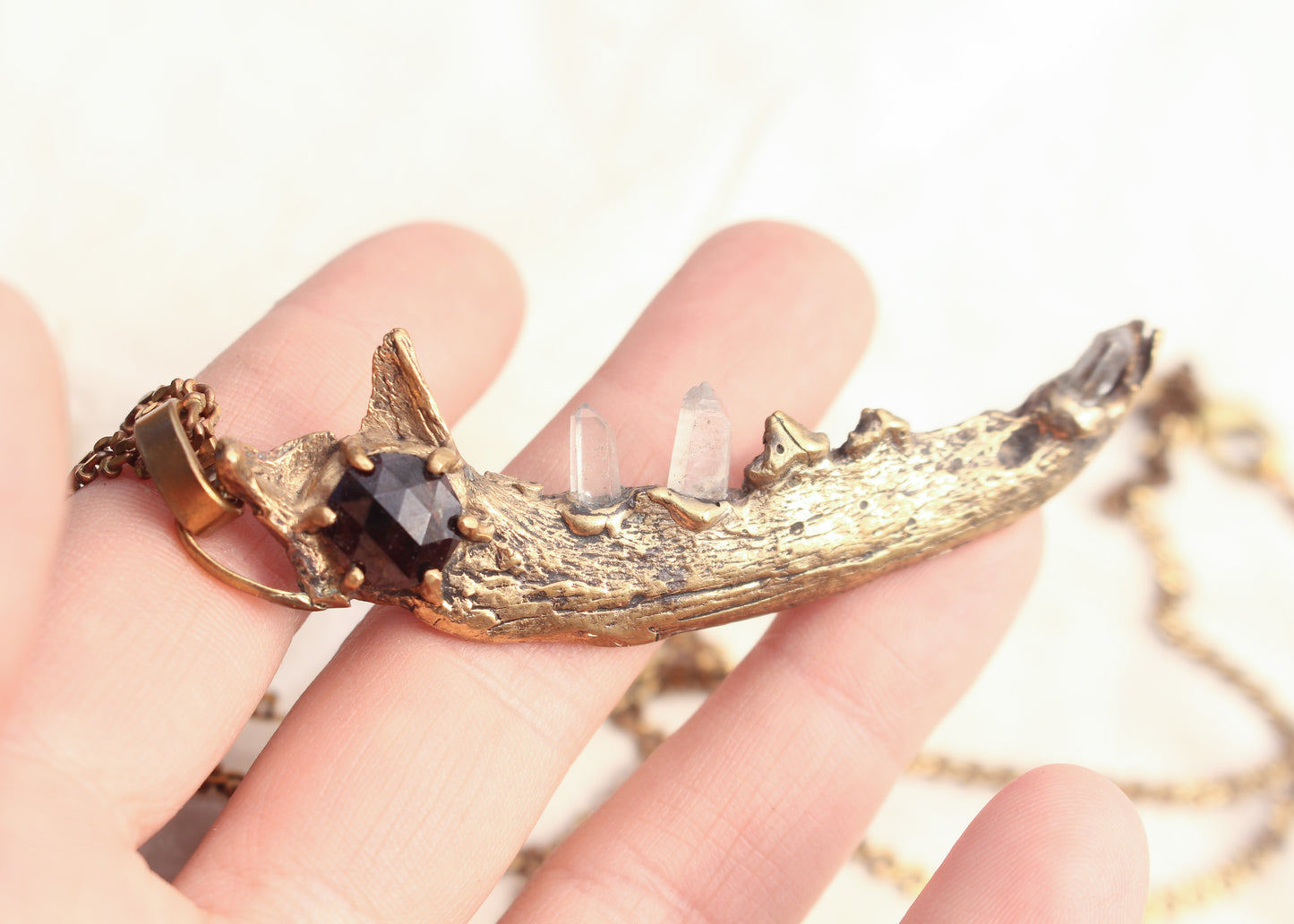 Faceted Garnet Jawbone with Quartz teeth necklace