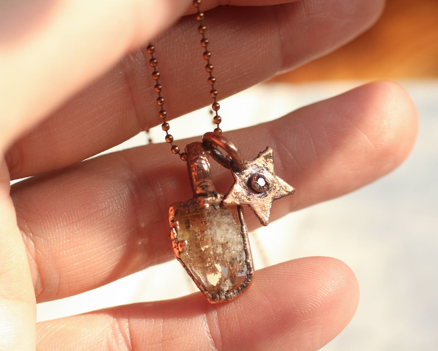 Raw and faceted Topaz charm necklace